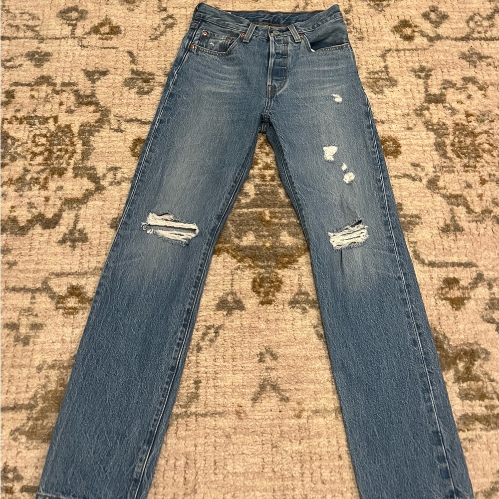 Distressed Blue Jeans